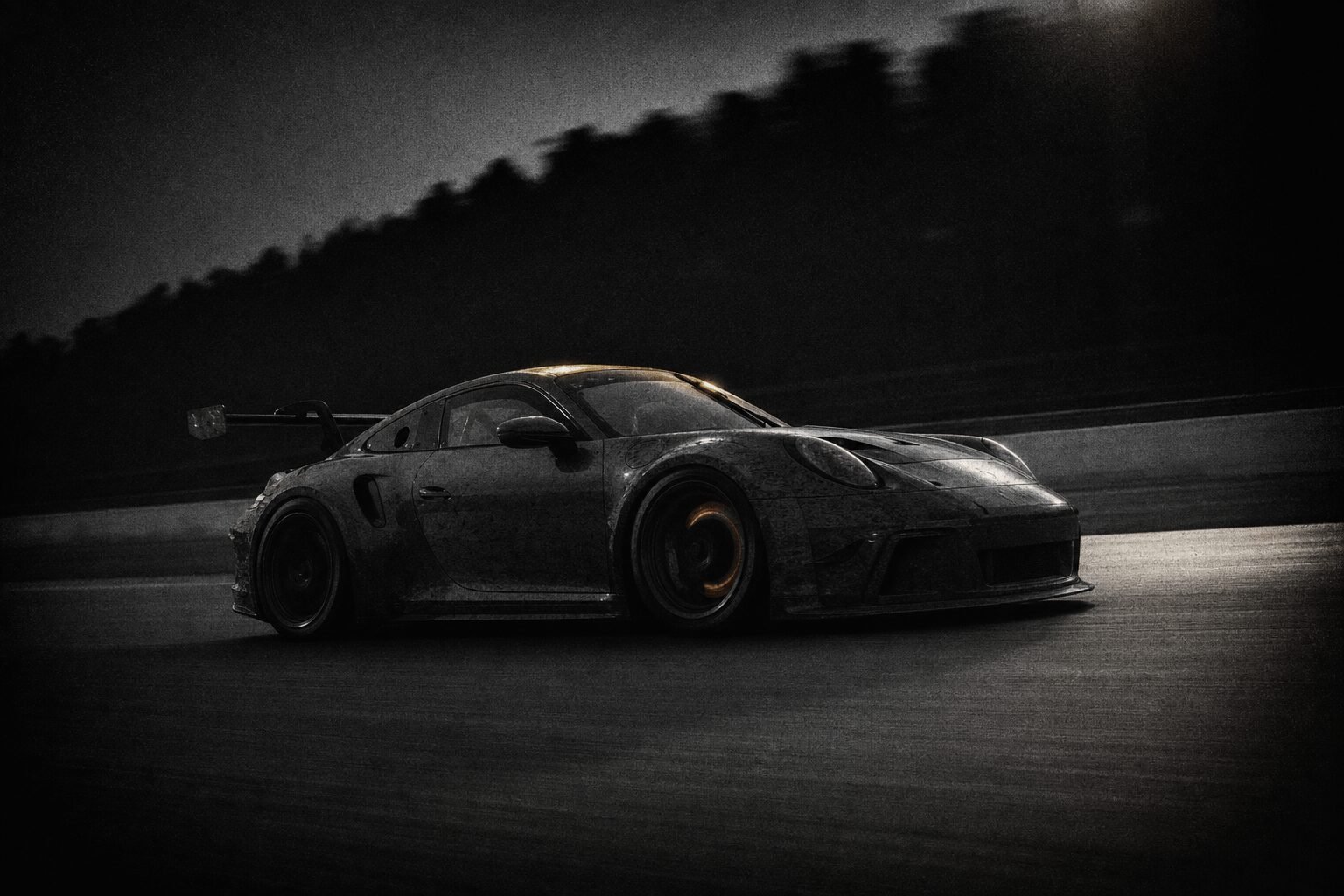 Race-prepared car at speed on a dark road course